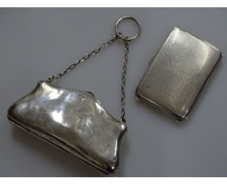 An engine turned silver cigarette case, and a lady's silver purse