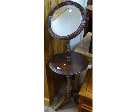 A Victorian mahogany telescopic shaving stand, on tripod legs