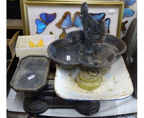 A cast-iron boot scraper, and kitchen scales and weights