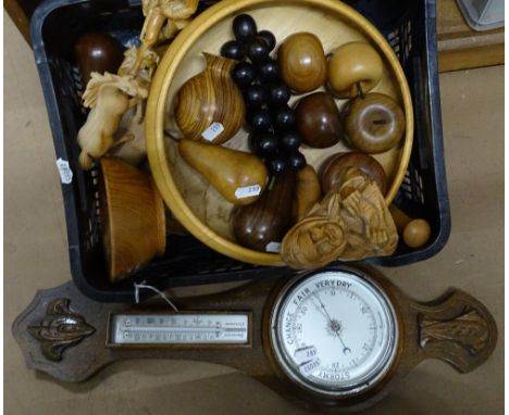 A barometer, treen fruit and figures, a clock etc