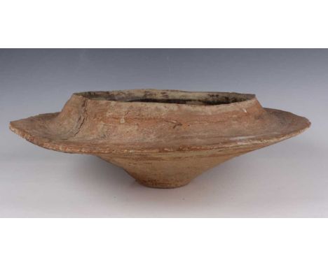A large Ruth Duckworth stoneware studio pottery sculptural bowl, 1960s, the black glazed interior with abstract surface benea