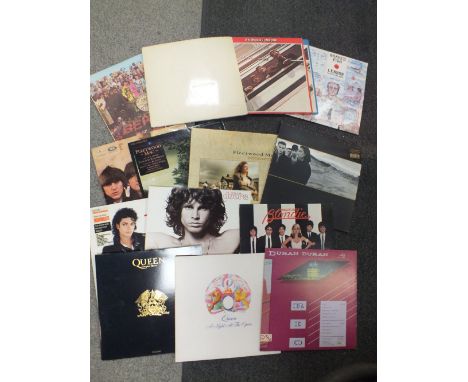 A SELECTION OF LP RECORDS TO INC THE DOORS, MICHAEL JACKSON, QUEEN, THE BEATLES WHITE ALBUM ETC