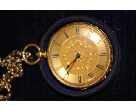 AN 18K CASED OPEN FACE MANUAL WIND POCKET WATCH ON 9CT CHAIN