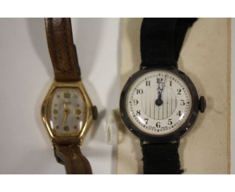 A 9CT GOLD TISSOT WRISTWATCH TOGETHER WITH A SILVER WATCH