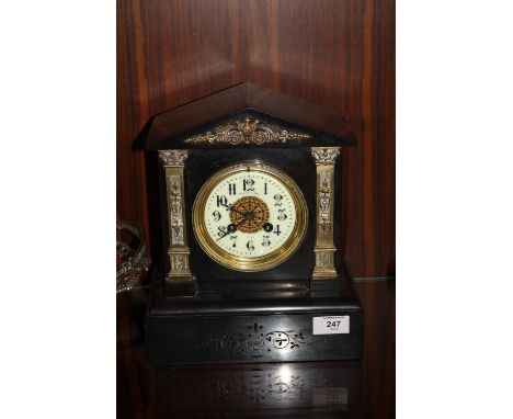 A 19TH CENTURY BLACK MARBLE MANTEL CLOCK, of architectural outline, the enamel dial, marked 'Pearce &amp; Sons Paris', H 27.5