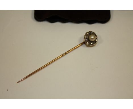 A DIAMOND AND SEED PEARL SET STICK PIN