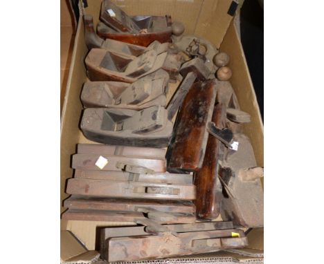 A collection of 12 19th century wood working planes and other tools