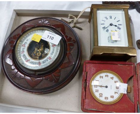 A 1920's VERTEX travelling clock, a 1977 QE11 Silver Jubilee carriage clock and an aneroid barometer