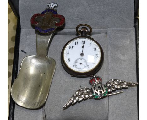 A silver and diamante RAF badge; an Edwardian fob watch; a caddy spoon