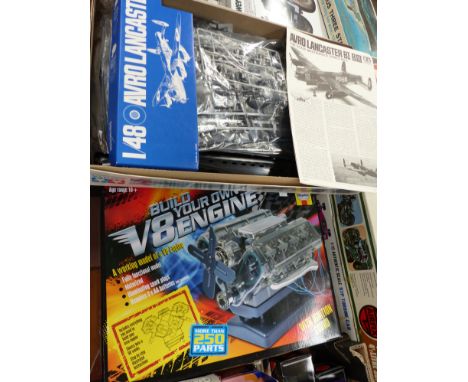 An originally boxed Tamiya Avro Lancaster B1/B3 bomber with instructions; an originally boxed Haynes V8 model engine case