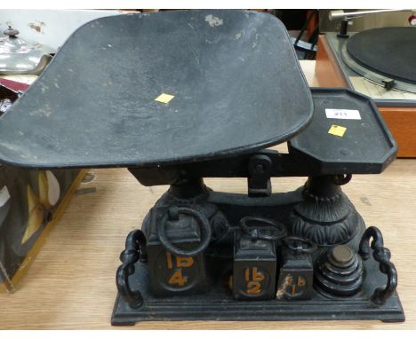 A vintage cast iron kitchen scales, an ironstone tea set