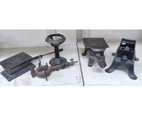Four 19th Century cast iron gas burner stands and a similar item 