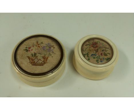 Two 19th century circular ivory patch boxes with needlework panels to the tops