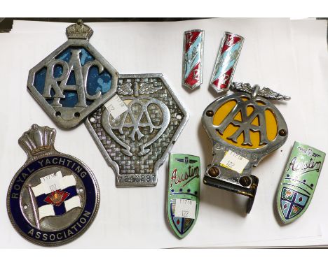 Two pairs of enamel Austin car badges, 2 AA badges, others related