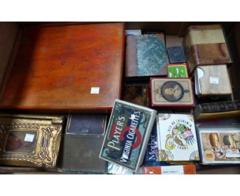 A selection of playing cards and playing card boxes