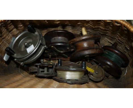 A Gemina metal fly reel, 3.5" and a selection of vintage wooden reels
