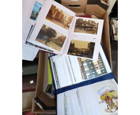 A collection of vintage and modern postcards and postcard collections