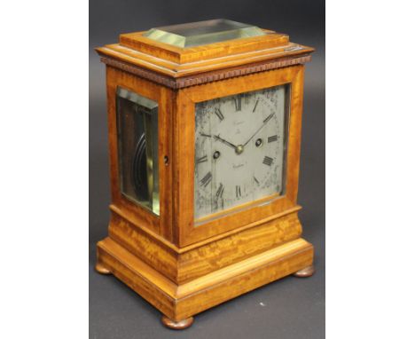 A Regency satinwood cased mantel clock with eight day twin fusee movement with silvered dial bearing Roman numerals, inscribe