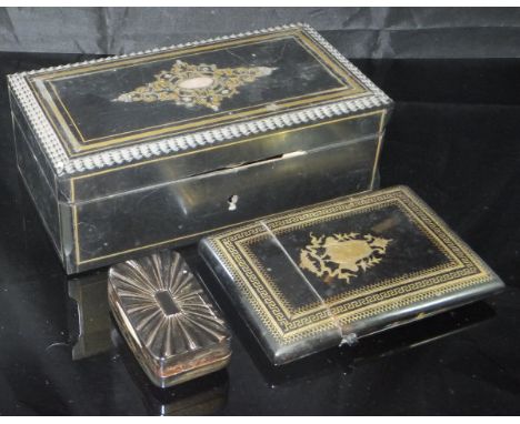 A 19th Century tortoiseshell card case with gold Greek Key and honeycomb style borders, with a central cartouche with flora a