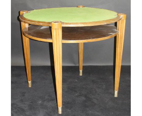 A 1920's French Art Deco card table of circular form by Dominique of Paris, the top with central green baize within a moulded