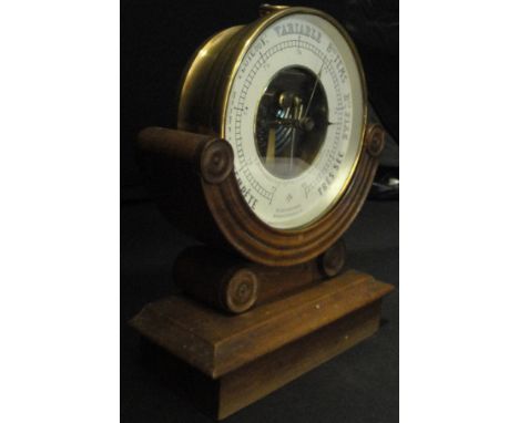 A circa 1890 French brass cased barometer, the dial marked "V.Doninelli Ingr Optn 15 Avenue de la Gare. Nice Barometre Holost