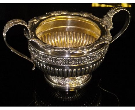 A William IV silver twin-handled sugar basin with shell decorated rim and Tudor style Rose decorated band to body above a gad