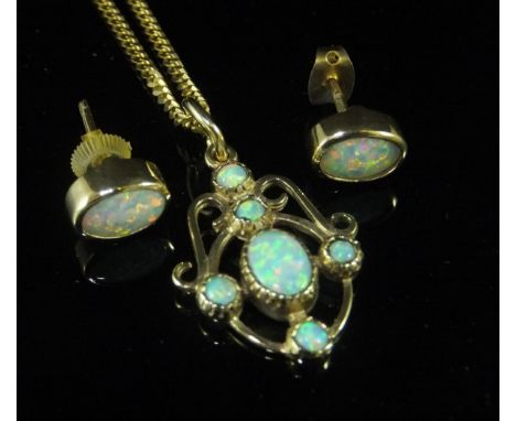 A pair of 9 carat gold and opal set earrings, together with a 9 carat gold and opal set filigree pendant on 9 carat gold chai