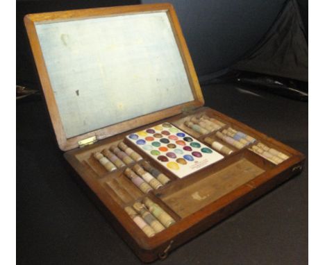 A James Hancock & Son of Worcester mahogany case of paints with twenty one glass bottles bearing paper labels and with conten
