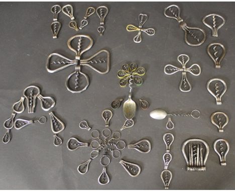 A collection of sixty various folding steel Bow corkscrews, some with multi-tools including miniature examples and various no