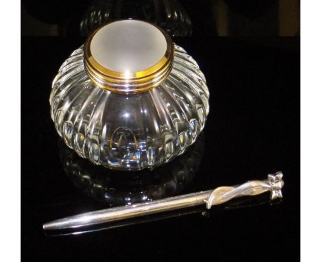 A ballpoint pen, the finial decorated with a bow, stamped "Tiffany & Co. Sterling 925", approx 12 cm long, together with a gl