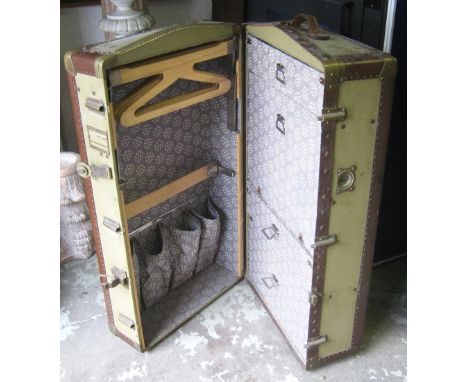 CABIN TRUNK, early 20th century green canvas with leather bindings and fitted interior, 102cm x 56cm x 32cm. 