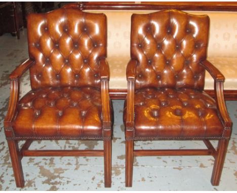 ARMCHAIRS, a pair, George III design tan brown leather deep button upholstered backs and seats, 59cm W. (2)