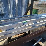 LOT OF ALUM SQUARE TUBE ON BOTTOM RACK & GROUND=258.9'