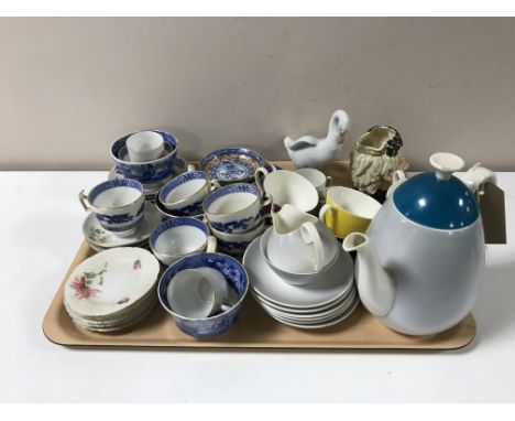 A tray containing a fifteen-piece Adderley bone china coffee service, miniature Royal Doulton character jugs, Nao figure, ori