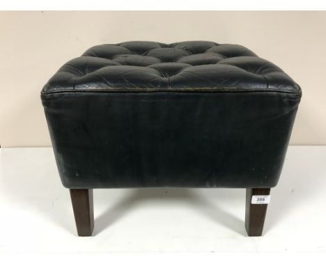 A blue button leather Chesterfield stool 