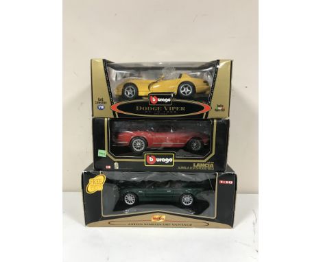 Five boxed Burago 1-18 scale die cast cars - Dodge Vipers, Aston Martin DB7 etc 