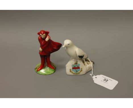 A Carlton crested china ornament - Winkie the Glad eye bird, together a Carlton china Collector's club figure - Mephisto (2)