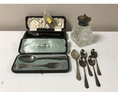 A collection of silver including cased baby spoon, cased spoon and fork, five teaspoons and a silver topped sugar sifter  