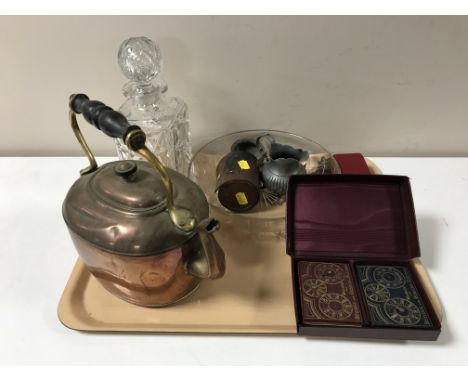 A tray containing copper teapot, cut glass decanter with stopper, cased dice and bezique game etc