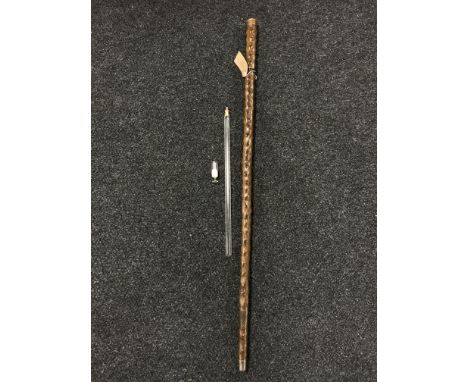 An unusual Gentleman's walking cane, the screw threaded pomell revealing a miniature drinking glass and also contained within