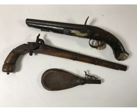 A George III Tower flintlock pistol, together with a 19th century percussion cap boot pistol and a leather shot flask (3 a/f)