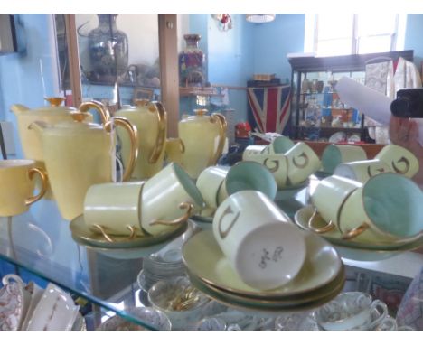 A Bespoke 'Poole' Pottery Part Coffee set, made for a Mr and Mrs J.H. Caldwell, mm E.M.W., dd 1923, comprising coffee pot, wa