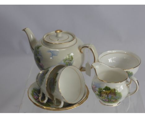 A Fine Bone China Tea Set "Royal Vale", comprising tea pot, milk jug, sugar bowl, six cups and saucers, six cake plates and o