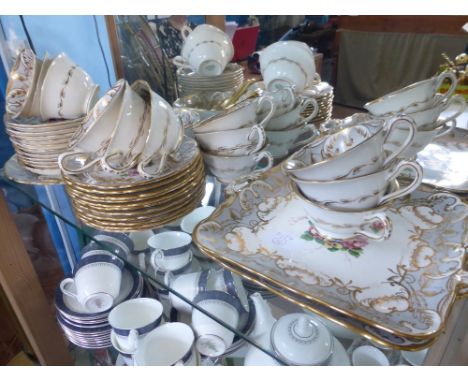 A Part Jackson & Gosling, 'Olde English' Grosvenor Tea Set, comprising twelve tea cups, twelve saucers, eleven cake plates, t