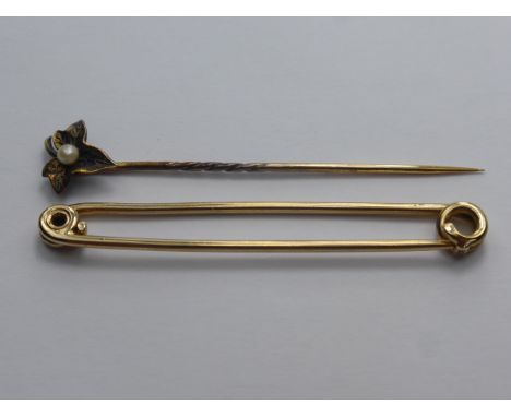 A 9 ct Gold Stock Pin, together with a gent's seed pearl tie pin, approx wt 4.4 gms.