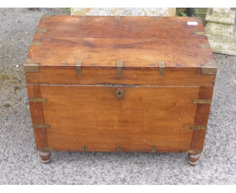 A Georgian Mahogany Campaign Chest, the chest having panel lidded candle box with letter rack, on turned feet, approx 63 x 36