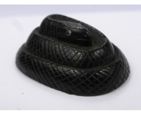 An Antique Japanese Ebony Carved Netsuke, in the form of a coiled snake, with enamel eyes, approx 3 x 3 cms, no character mar