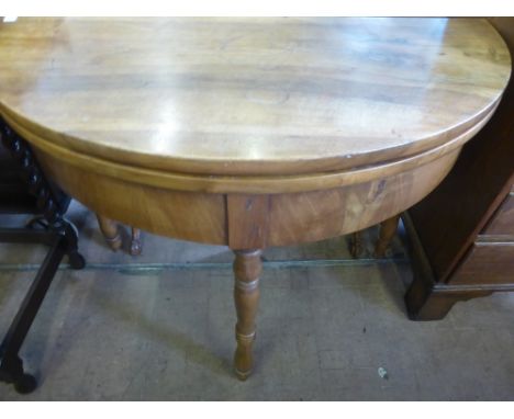 A Victorian Mahogony Demi Lune Open Leaf Hall Table, on turned legs, approx 100 x 101 x 76 cms.