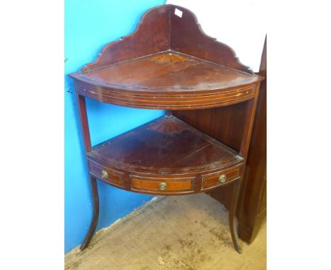 An Antique Mahogany Corner Wash Stand Table, the wash stand having a single shelf with three faux drawers below, on splayed l