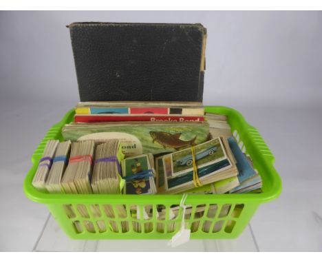 A Large Quantity of Brooke Bond and Other Tea and Cigarette Cards, together with two sets of playing cards.